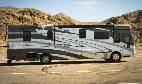 A large recreational vehicle in a parking lot
