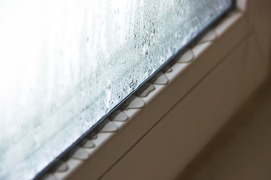 Condensation Dripping Down A Window
