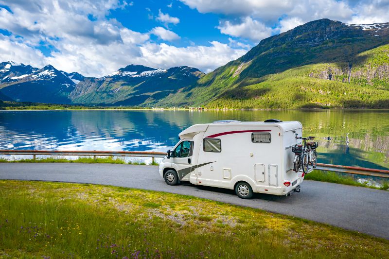 RV Traveling Beside A Lake RV Traveling Beside A Lake