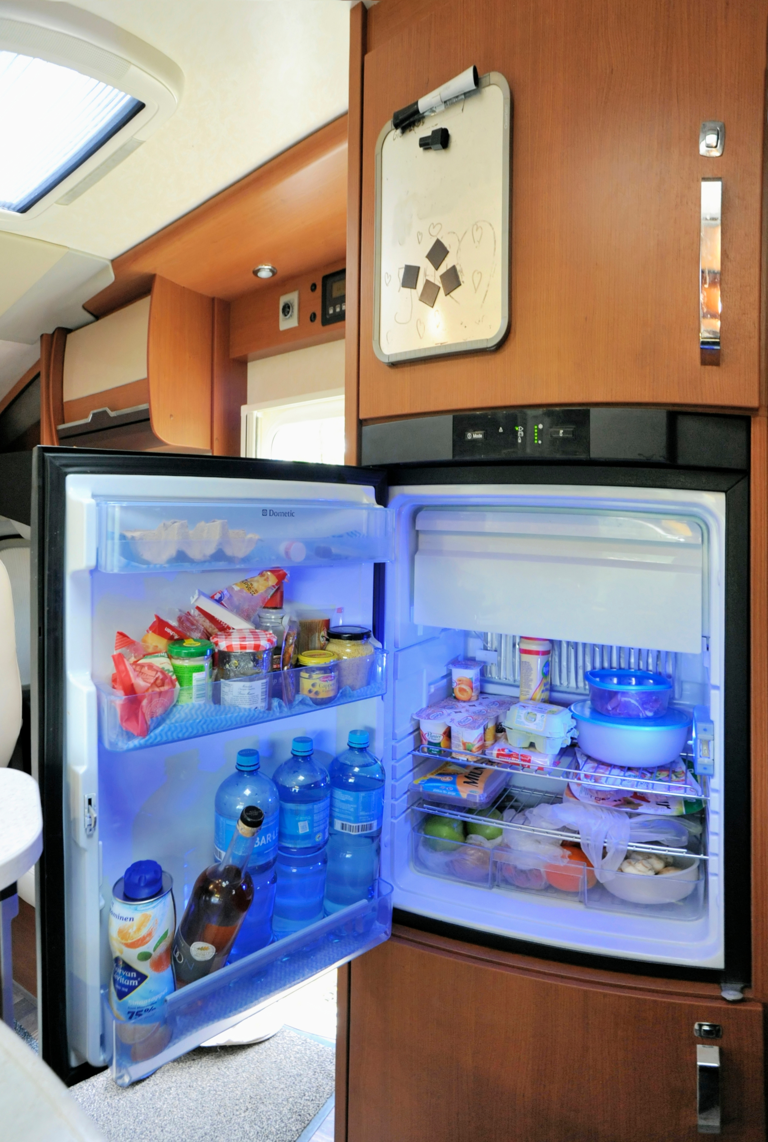 Open RV Refrigerator Full Of Food