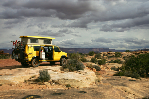 Camper Van Parked Over Desert