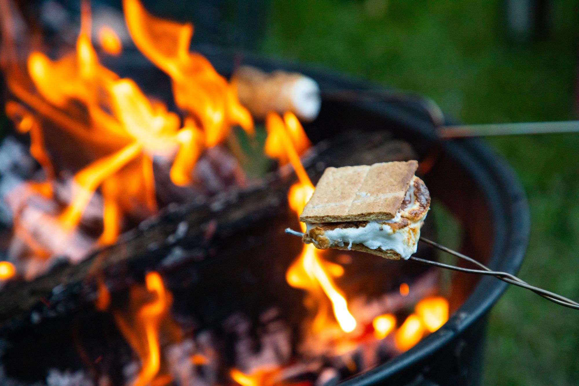 s'more cooking over a campfire