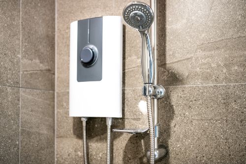 Water Heater Next To Handheld Showerhead